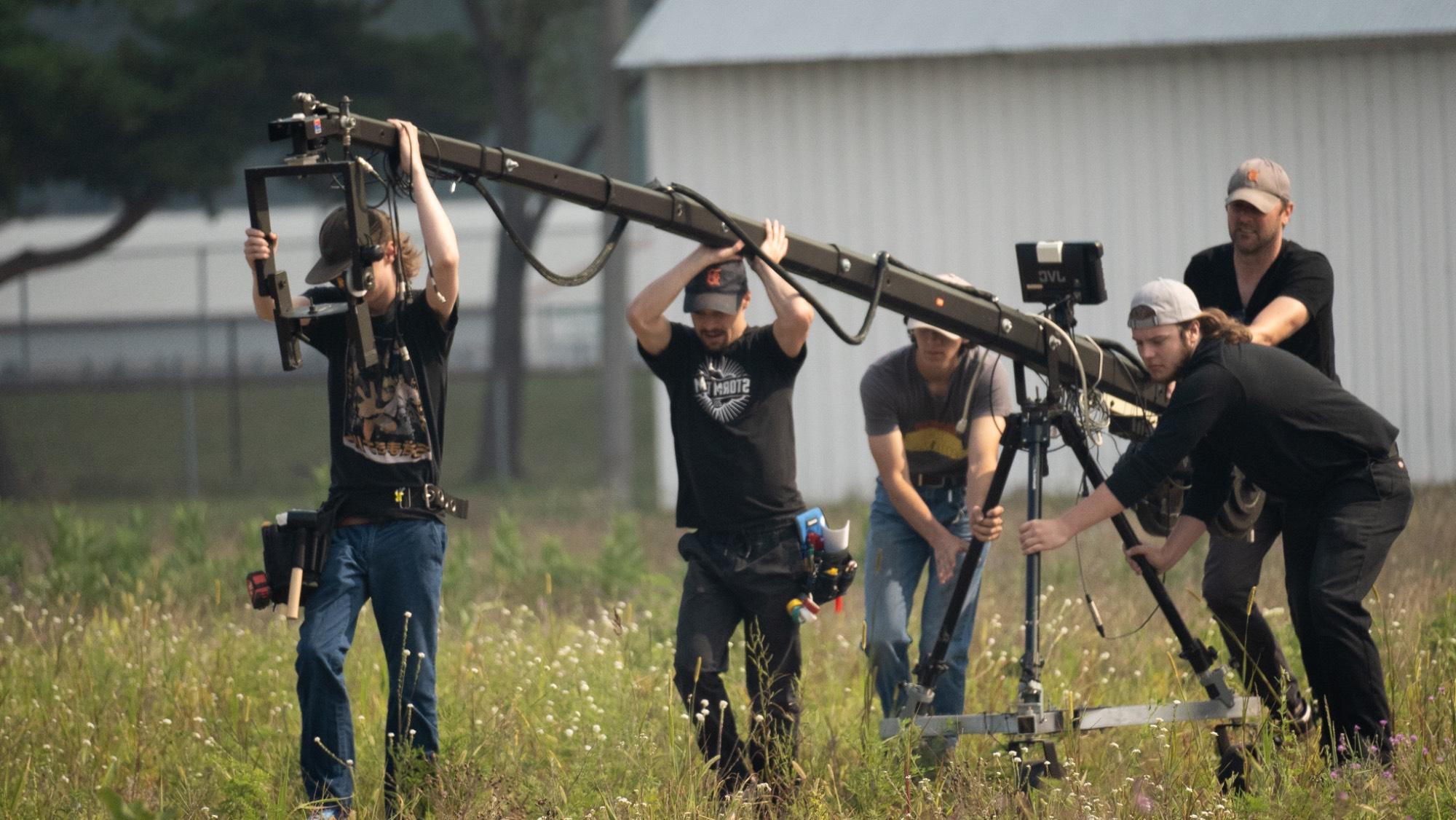 Image of students working on a production